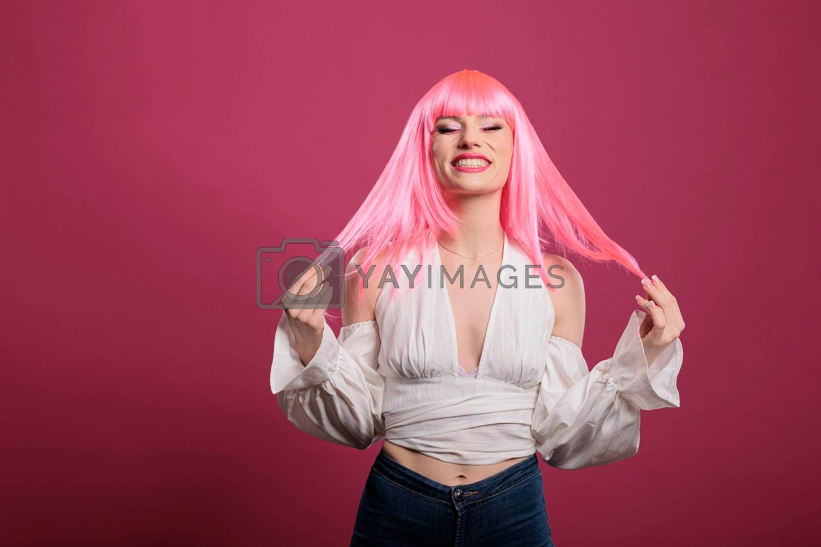 Royalty free image of Portrait of caucasian woman smiling in front of camera by DCStudio