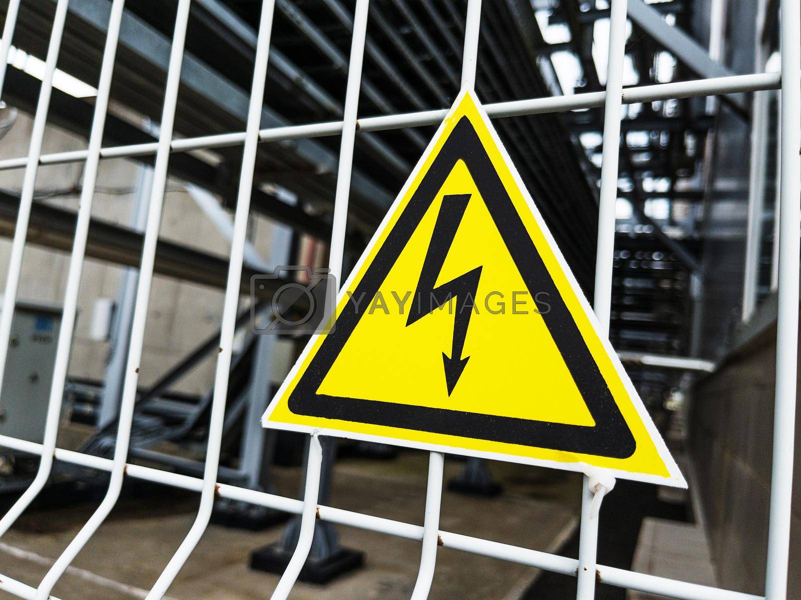 Royalty free image of The sign in the yellow triangle is Danger by AlexGrec