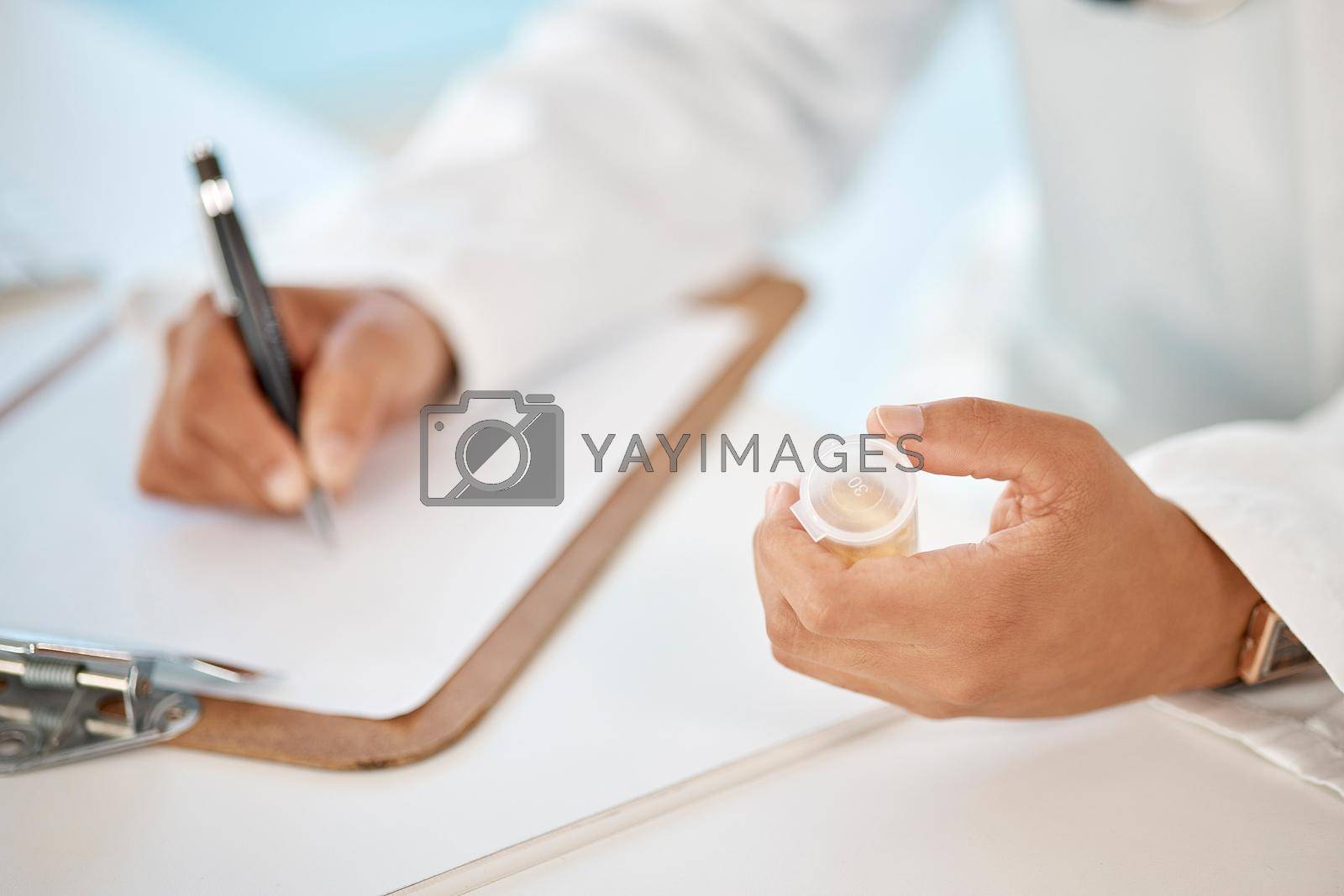 Royalty free image of Prescription, pharmacy and medicine with doctor, healthcare worker or physician handing drugs treatment. Pharmacist or medical specialist writing out form for recovery, cure or antibiotics by YuriArcurs