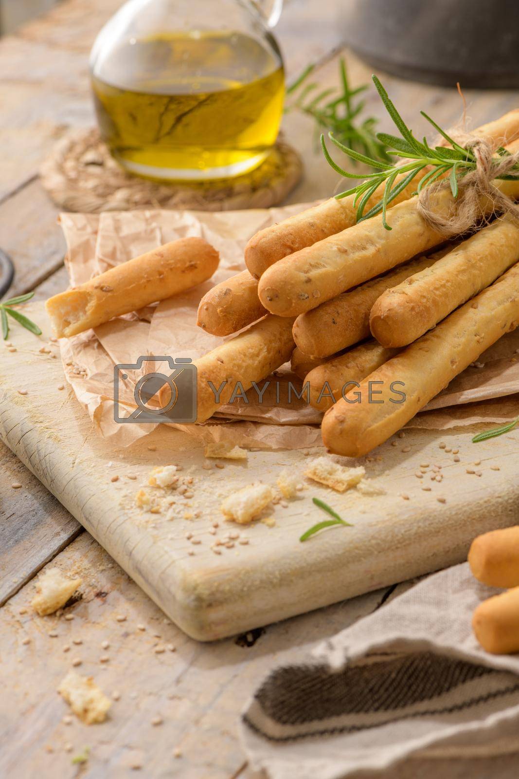 Royalty free image of Traditional italian breadsticks grissini  by homydesign