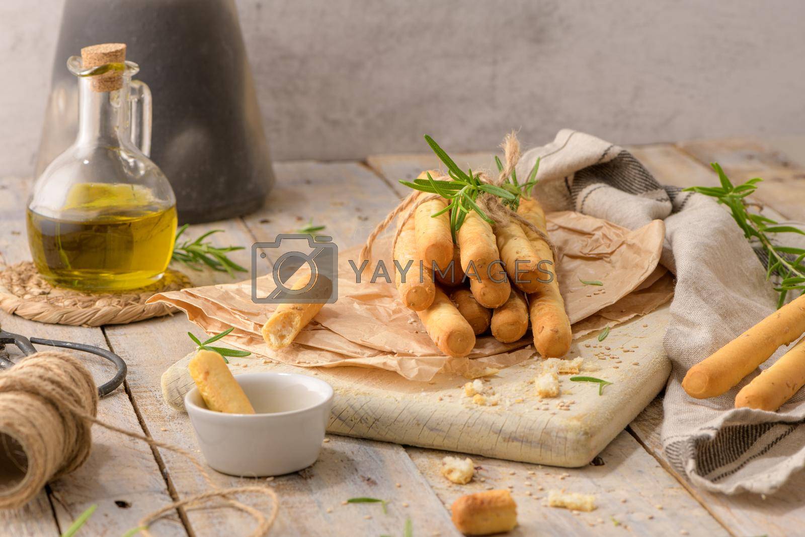 Royalty free image of Traditional italian breadsticks grissini  by homydesign