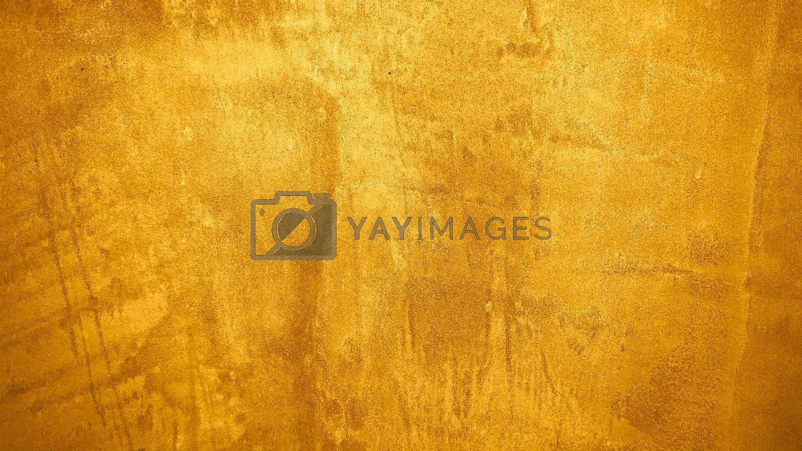 Royalty free image of Texture of golden decorative plaster or concrete. Abstract grunge background for design by Benzoix