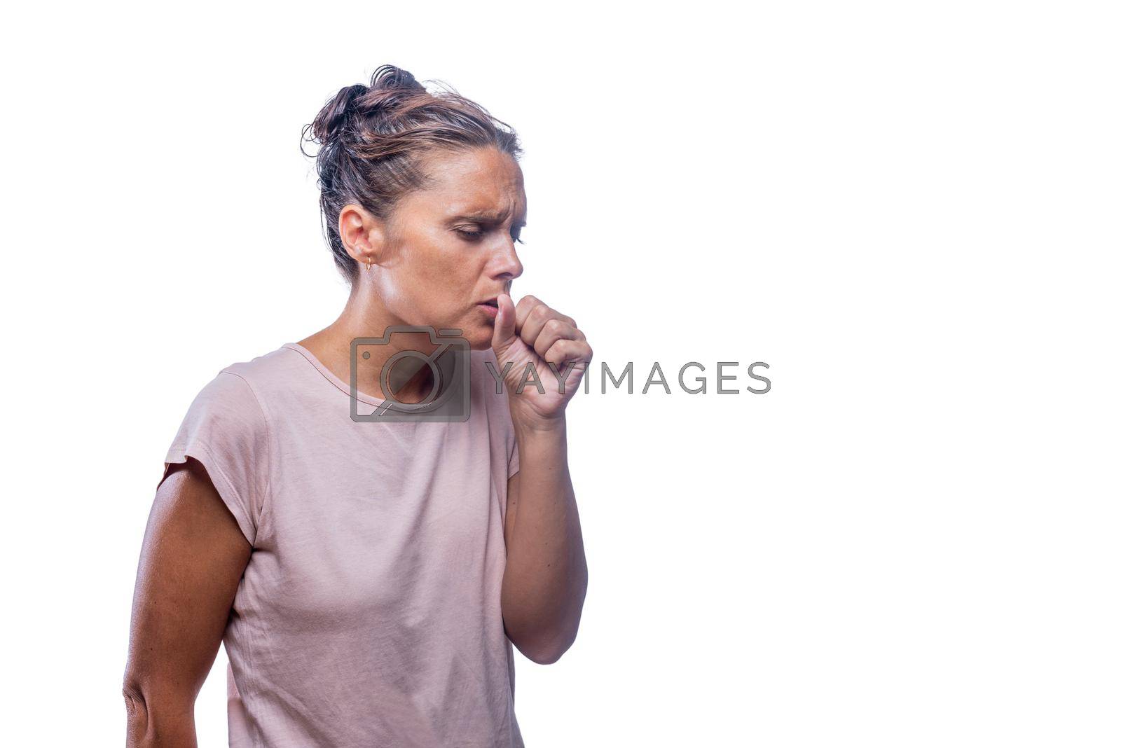 Royalty free image of An adult woman with cough on a white background by ivanmoreno