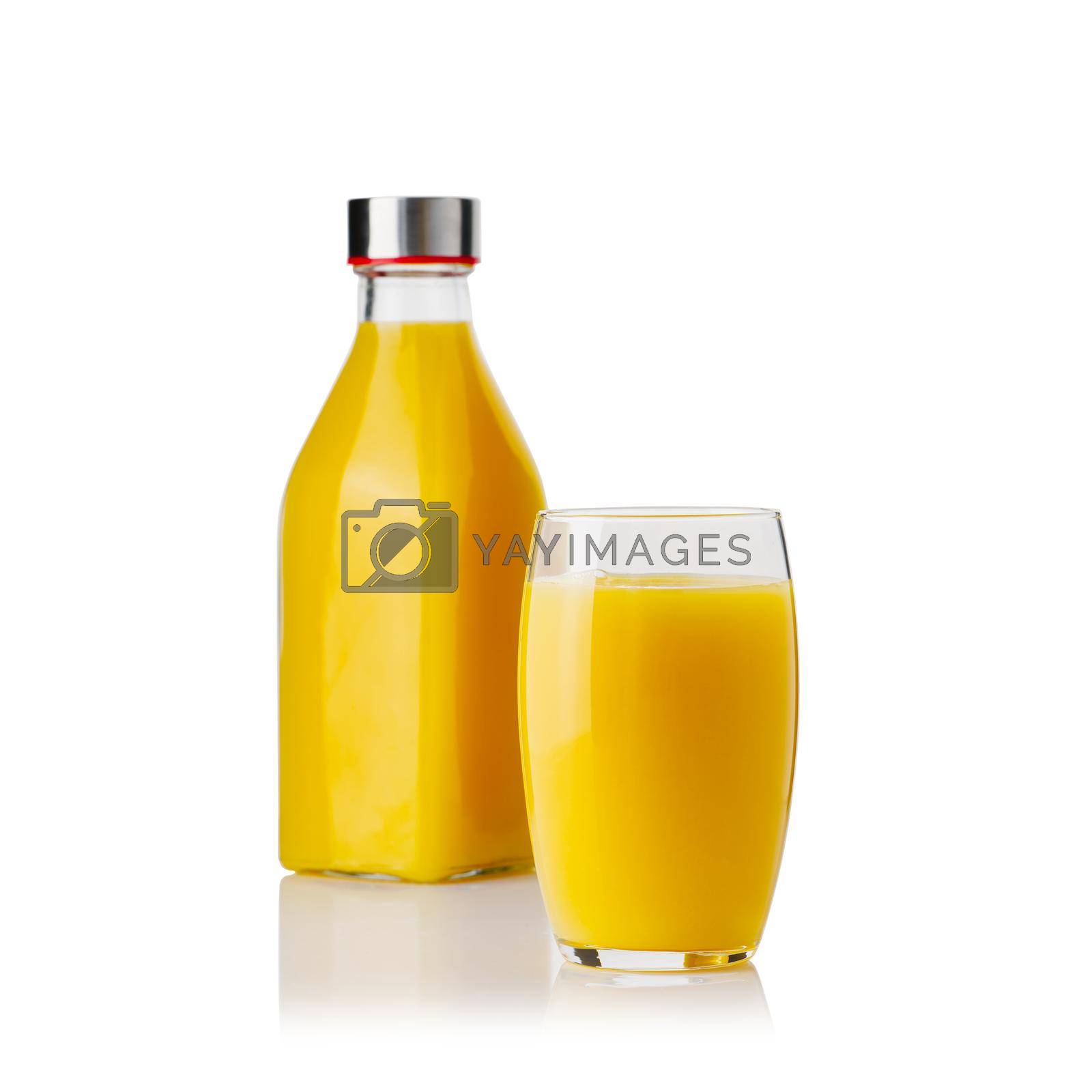 Royalty free image of Glass of orange juice and orange juice bottle. Fresh tropical juice. by PhotoTime