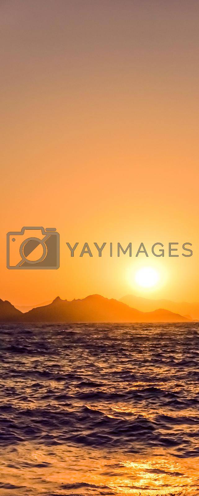Royalty free image of Summer sunset at the Mediterranean sea coast, seascape and mountain view by Anneleven