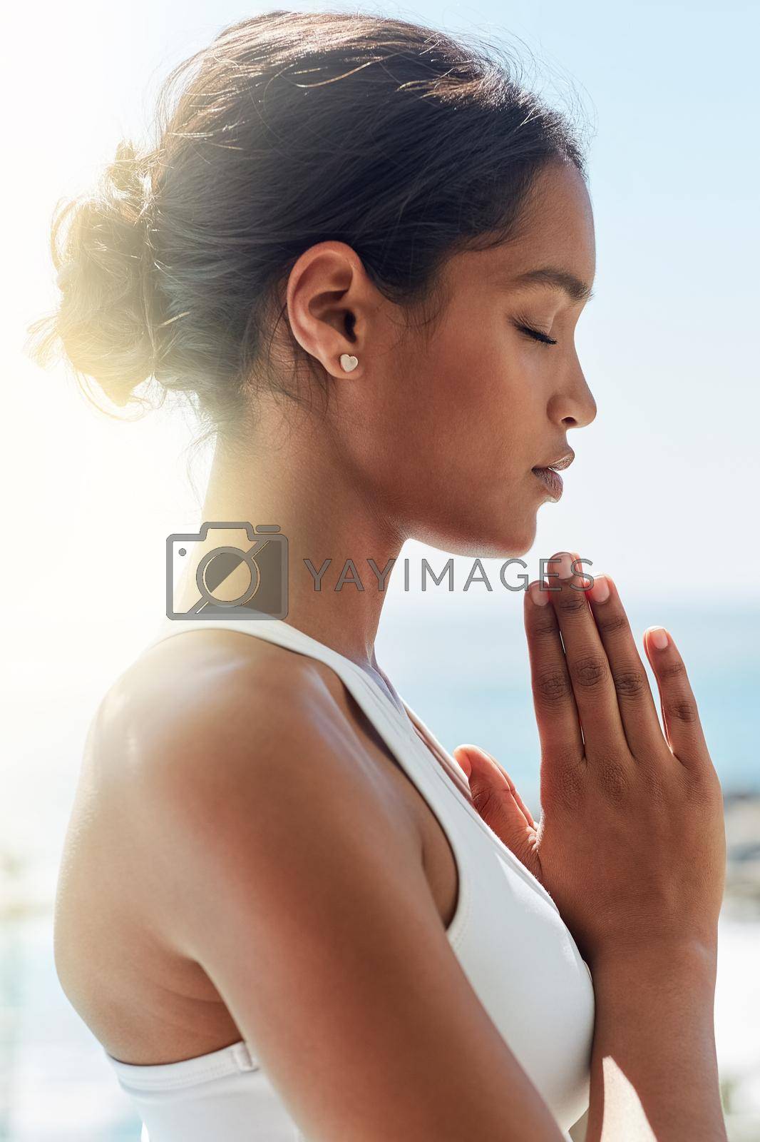 Transforming body and mind. a young woman doing yoga exercises