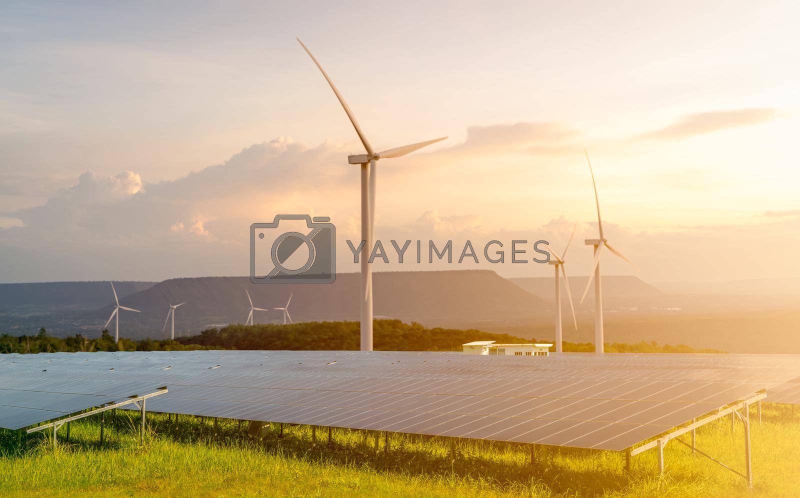 Royalty free image of Sustainable energy. Solar and wind turbines farm. Sustainable resources. Solar, wind power. Renewable energy. Sustainable development. Photovoltaic panel. Green energy. Alternative electricity source. by Fahroni