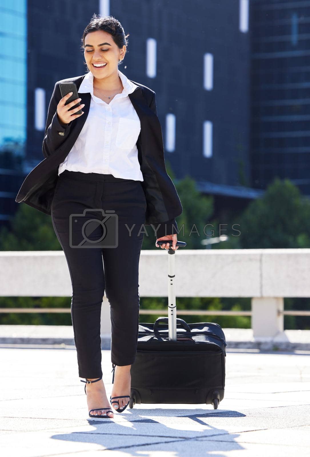 Business woman, travel with luggage and phone for communication with work, internet or web search. Corporate employee going to airport to catch plane for company tradeshow, conference or workshop.