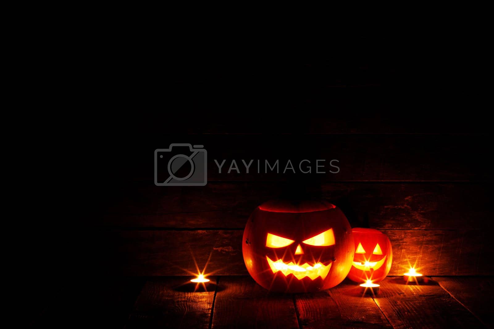 Royalty free image of Halloween lantern pumpkins candles by Yellowj