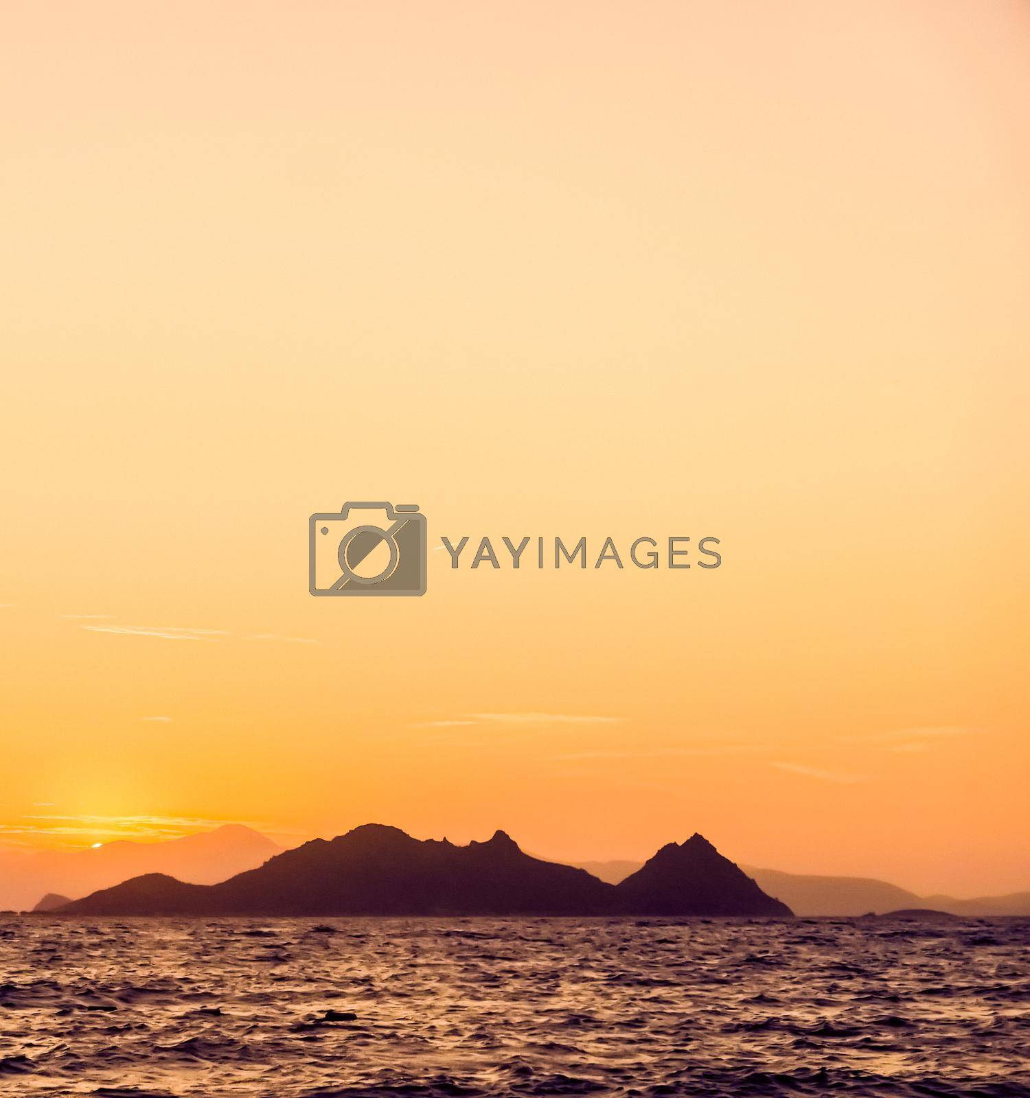 Royalty free image of Summer sunset at the Mediterranean sea coast, seascape and mountain view by Anneleven