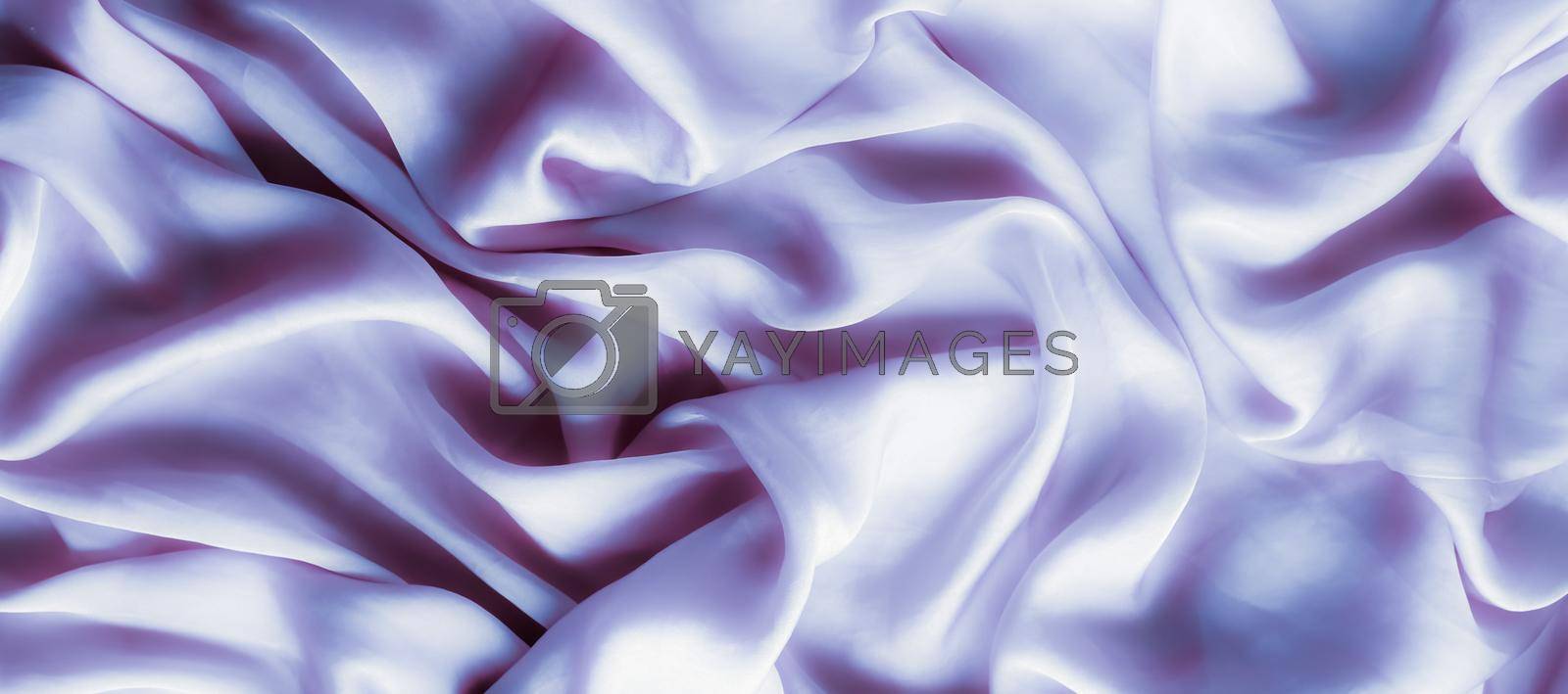 Royalty free image of Purple soft silk texture, flatlay background by Anneleven