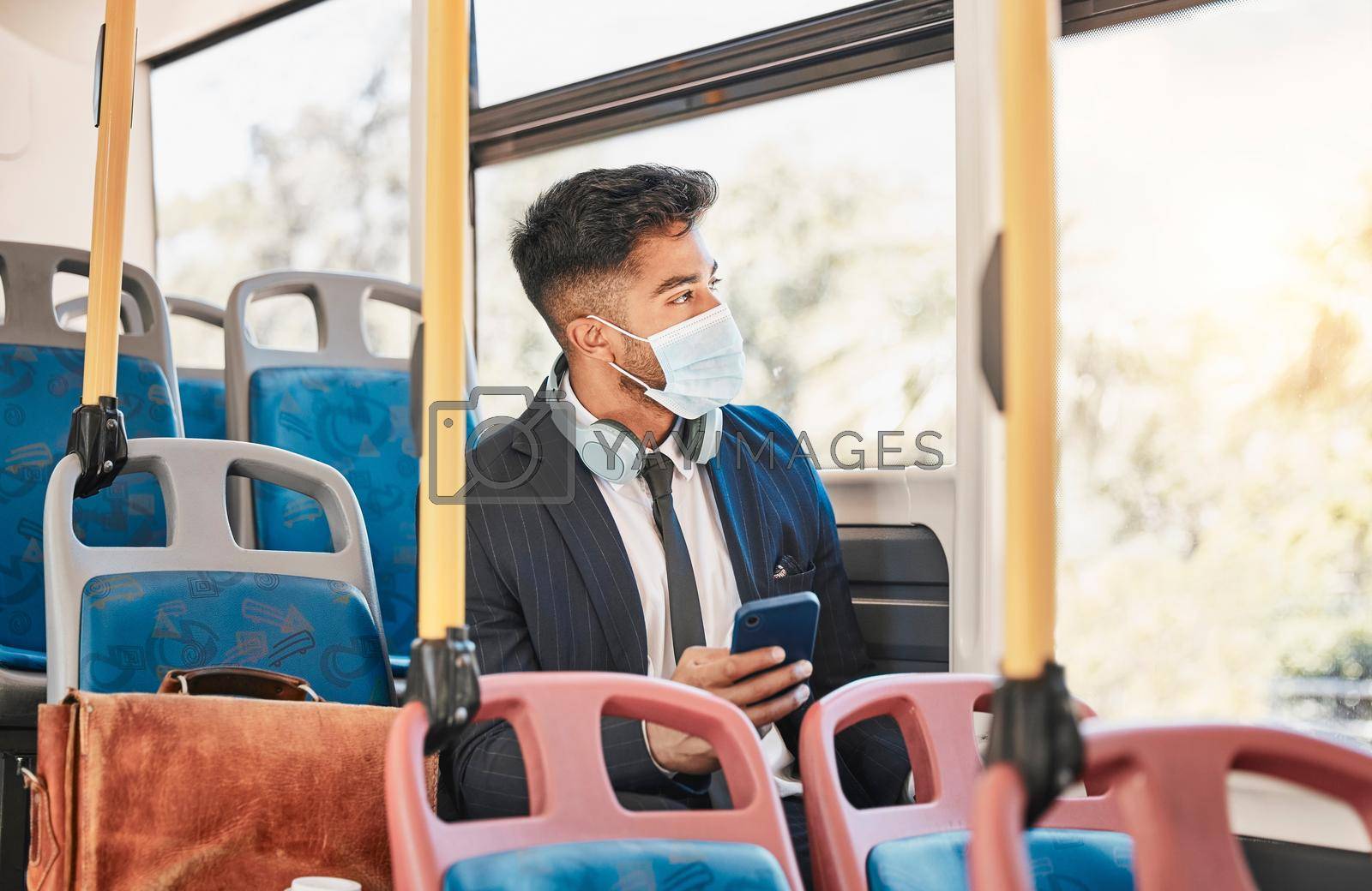 Covid, bus travel and business phone while on public transport commute with pandemic regulations. Worker with face mask protection while travelling to work for virus safety and prevention