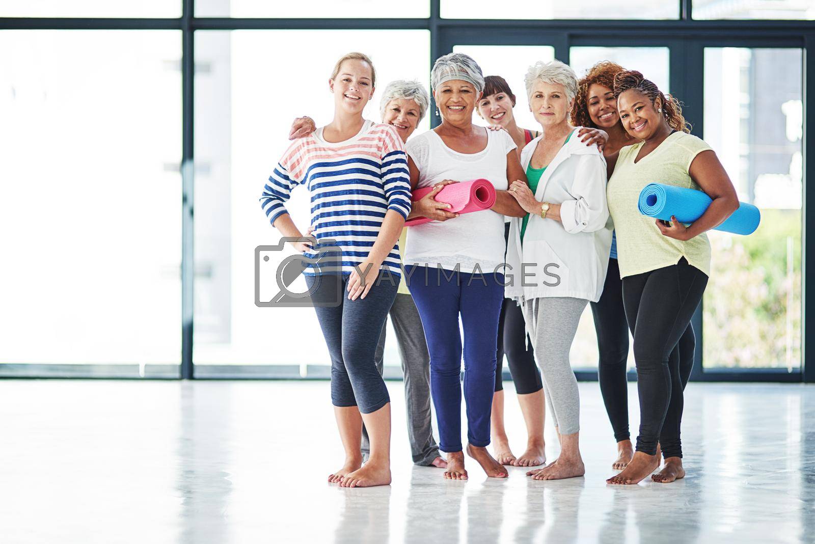 Yoga is for everyone. a group of women waiting for yoga class to begin