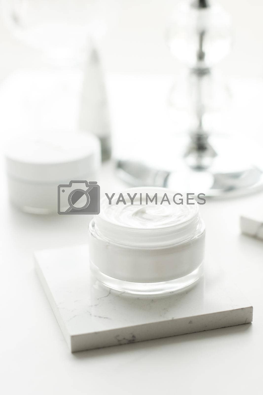 Royalty free image of Luxury skincare cosmetics in a bathroom by Anneleven