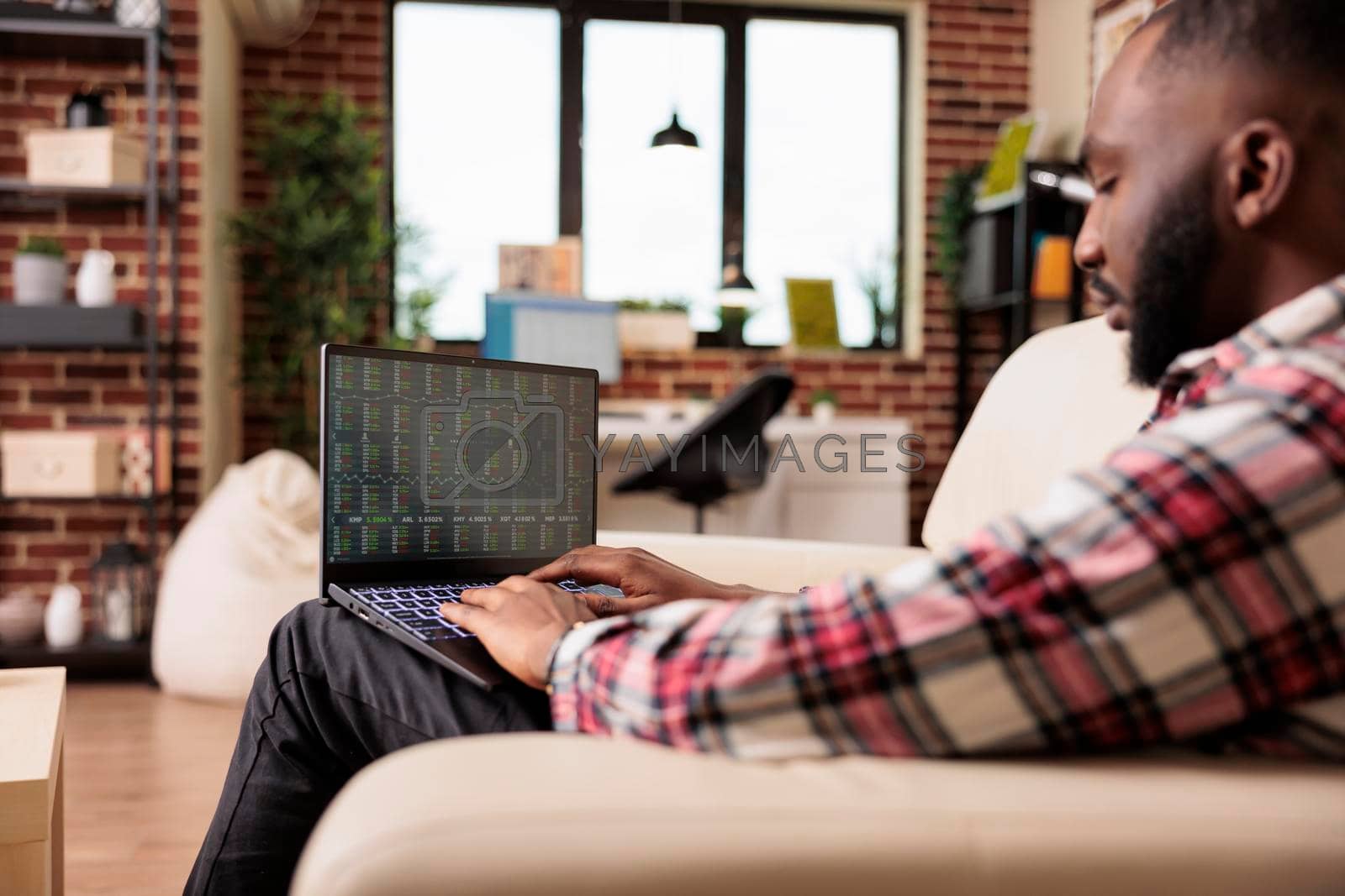Royalty free image of Financial analyst looking at stock market statistics by DCStudio