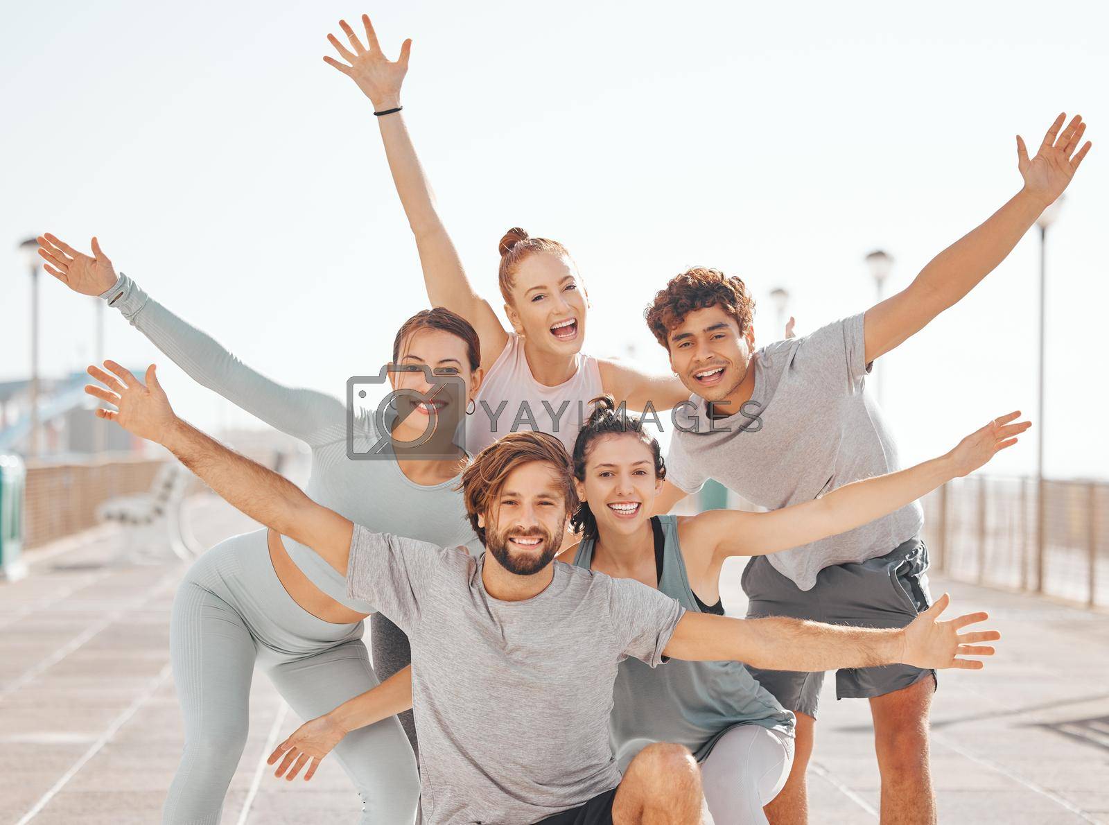 Royalty free image of Portrait of happy outdoor fitness friends, community or team with fun excited energy relax after exercise, sports or training. Winner, team building and people celebrate after cardio marathon running by YuriArcurs