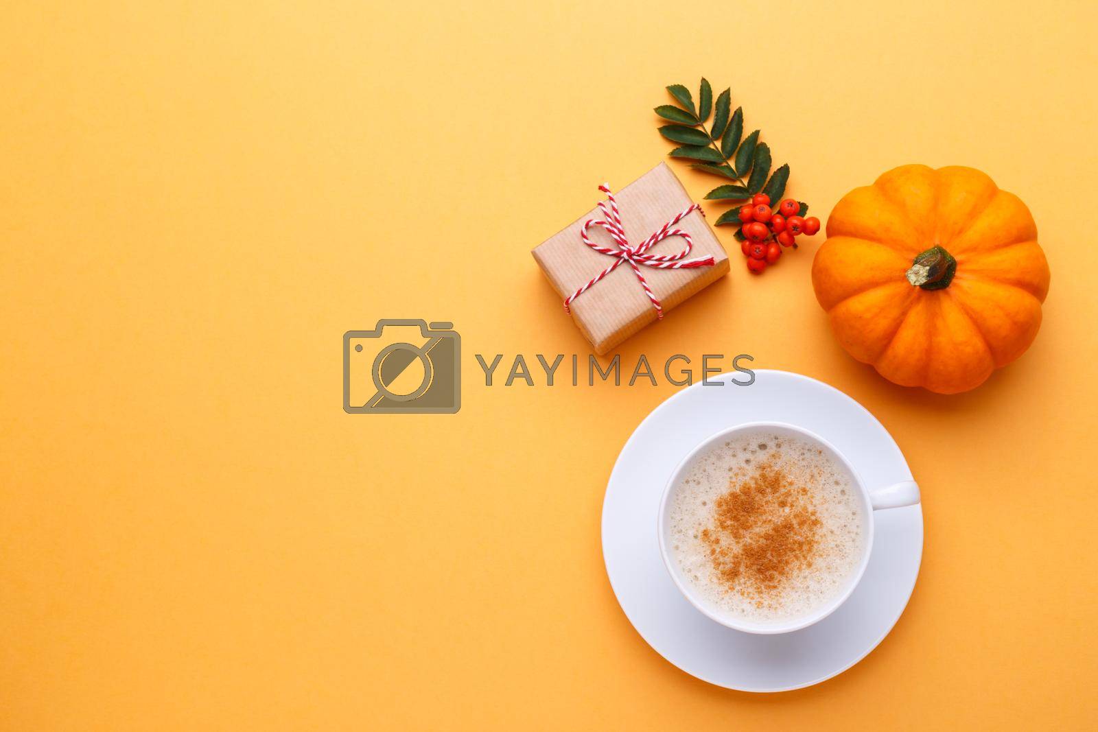 Royalty free image of Cup of coffee and pumpkin by Lana_M