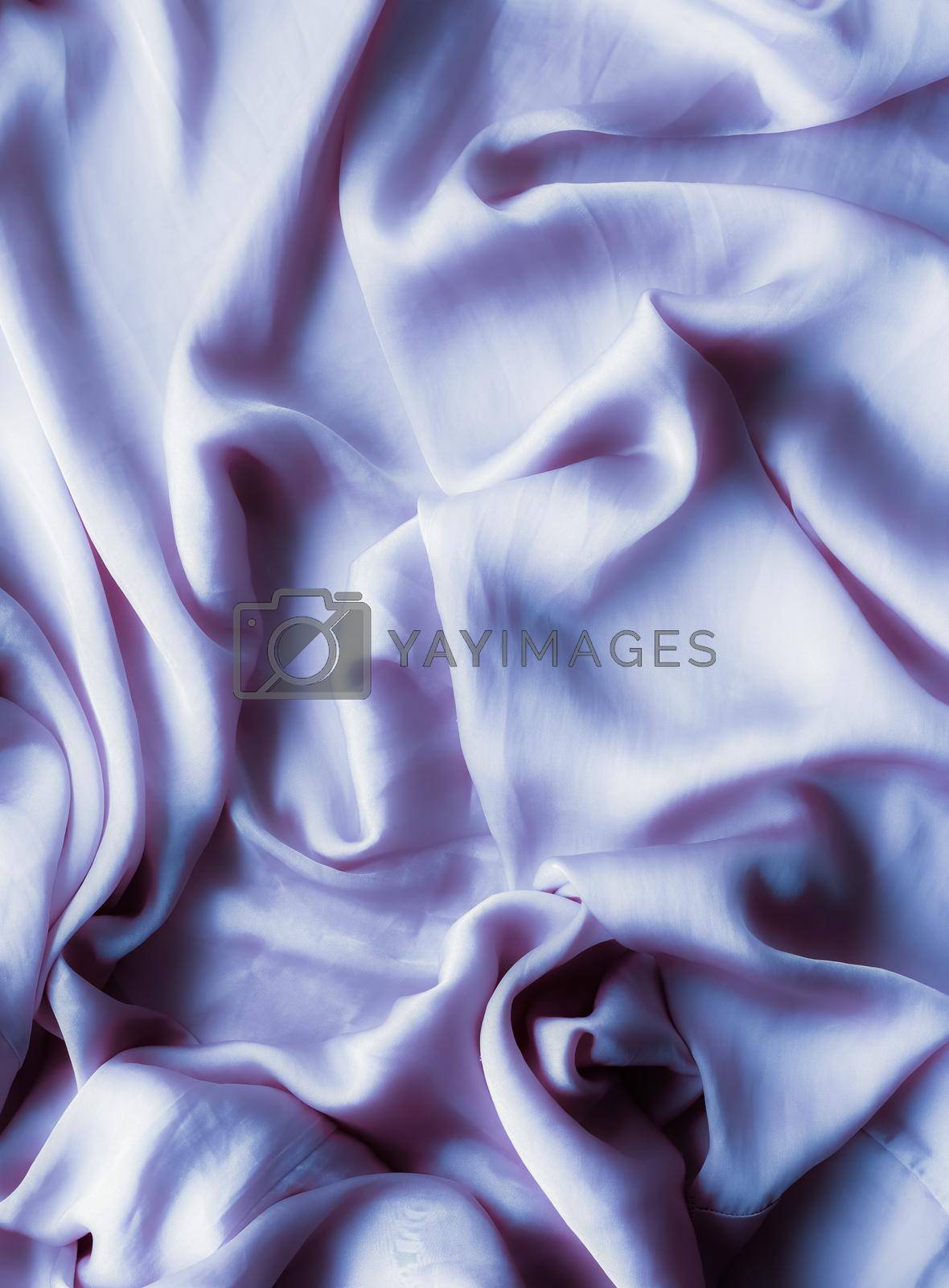 Royalty free image of Purple soft silk texture, flatlay background by Anneleven