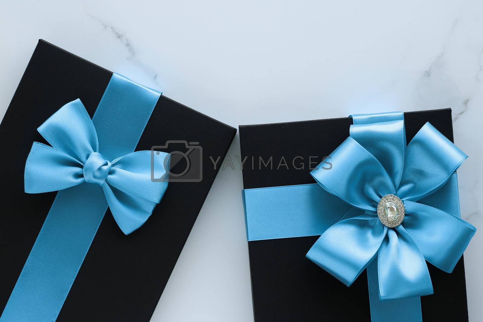 Royalty free image of Luxury holiday gifts on marble by Anneleven