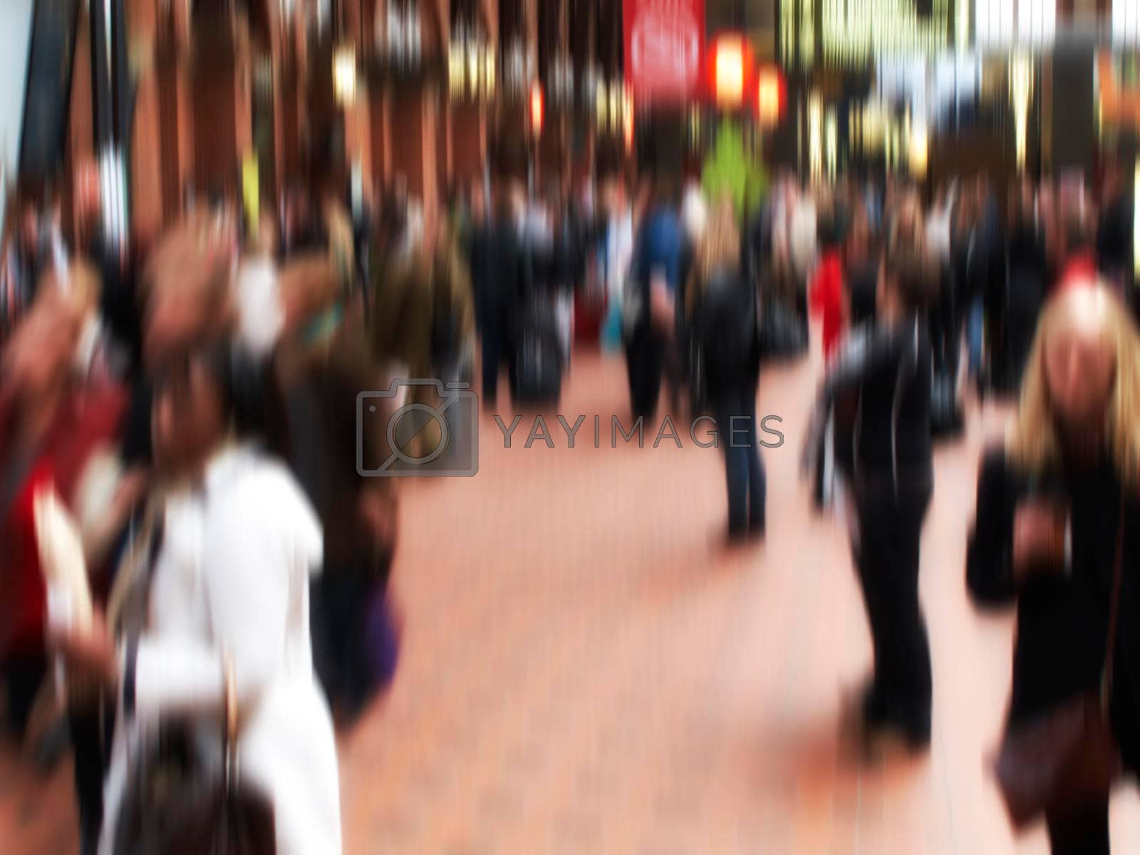 Royalty free image of Motion blurred city life. Motion and lens blurred photo of city people. by YuriArcurs