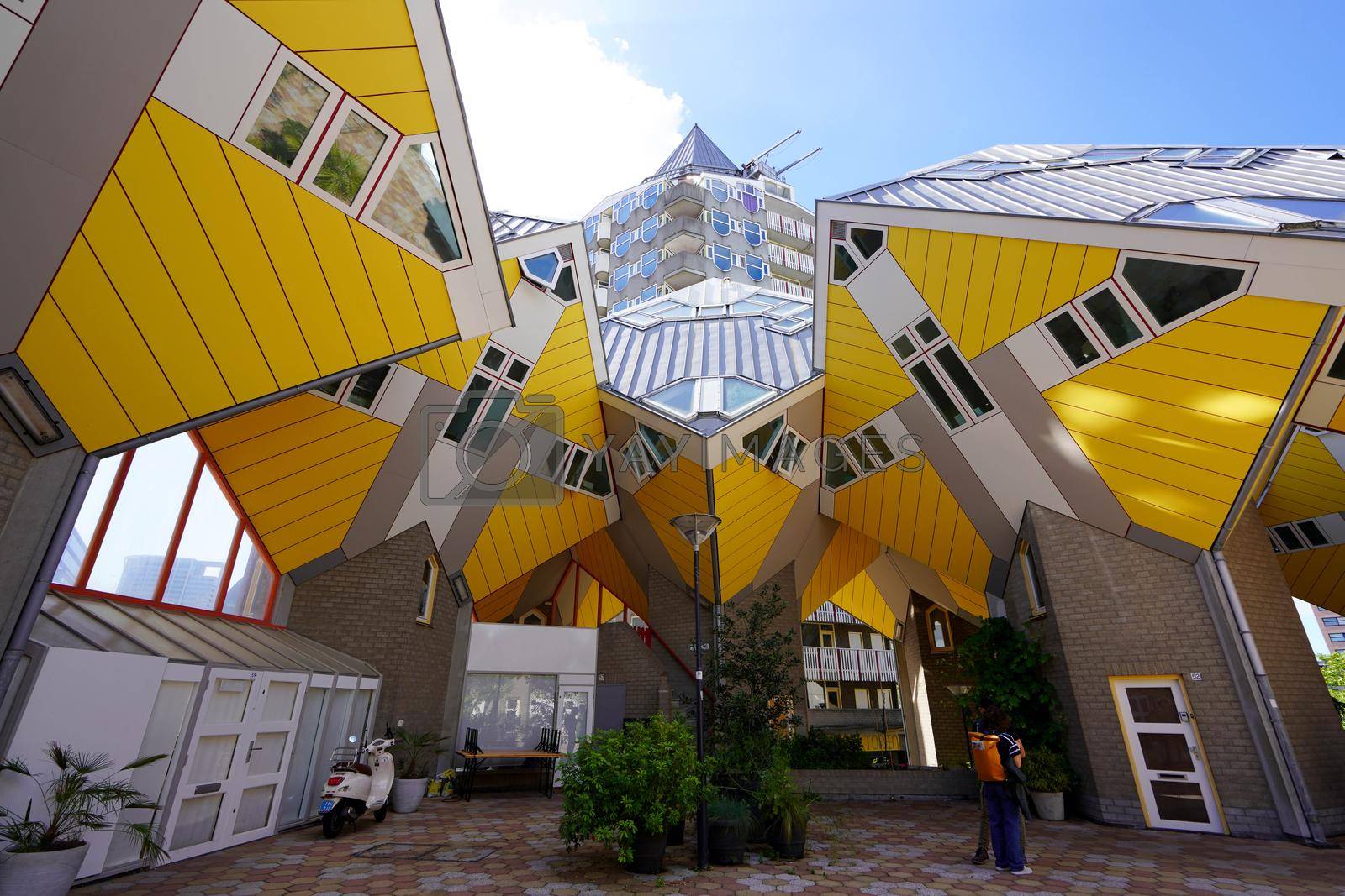 ROTTERDAM, NETHERLANDS - JUNE 9, 2022: Cube Houses and Blaak tower in Rotterdam, Netherlands