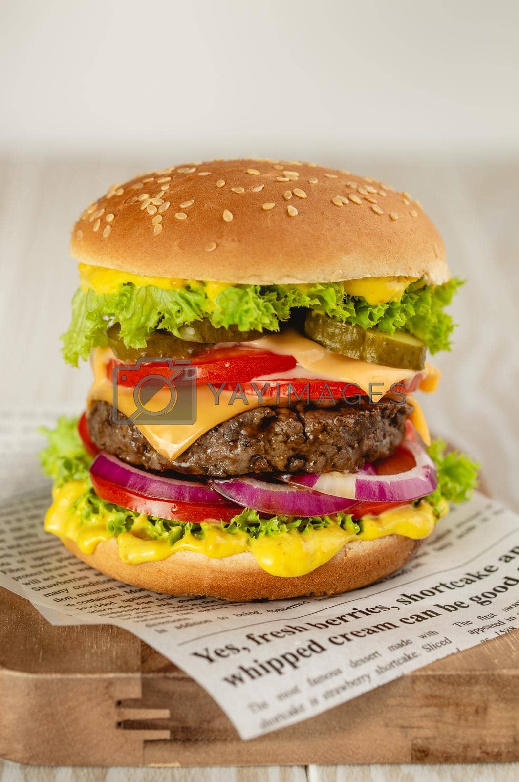 Royalty free image of Fresh tasty burger by its_al_dente