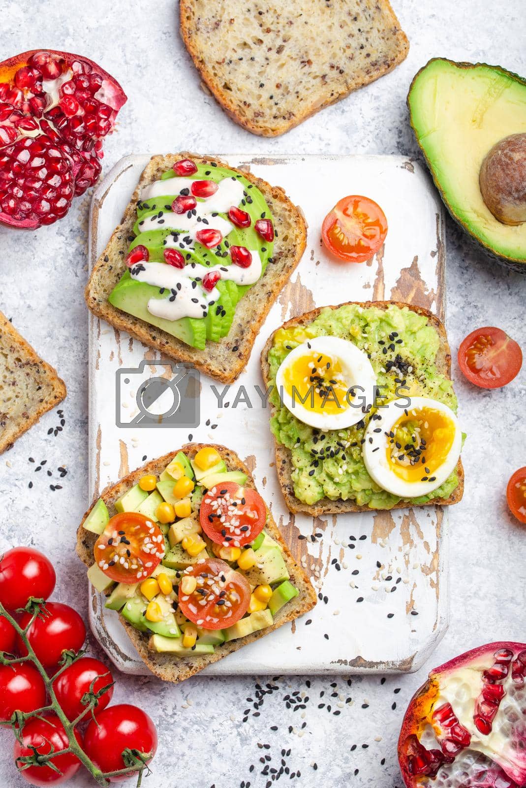 Royalty free image of Avocado healthy  toasts by its_al_dente