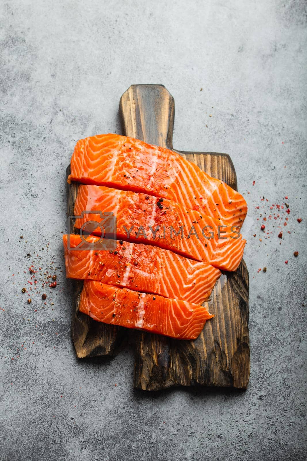 Royalty free image of Delicious raw salmon fillet by its_al_dente