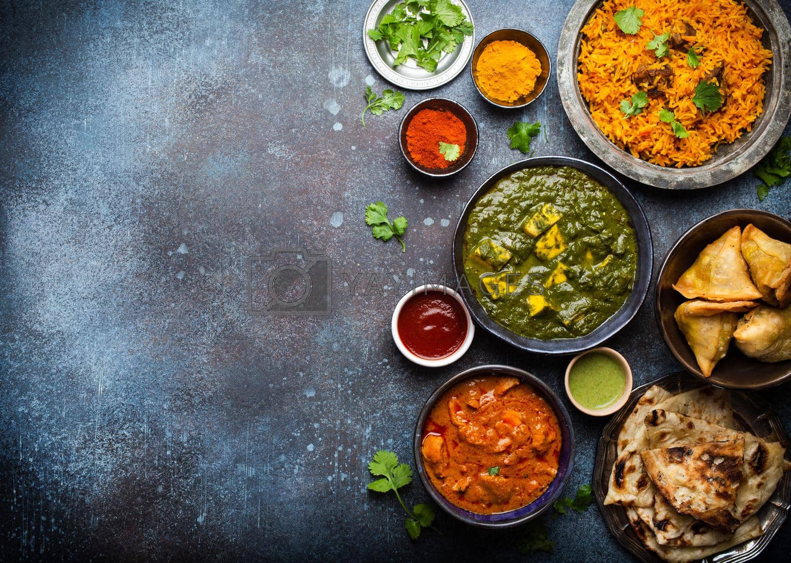 Royalty free image of Authentic Indian dishes and snacks by its_al_dente