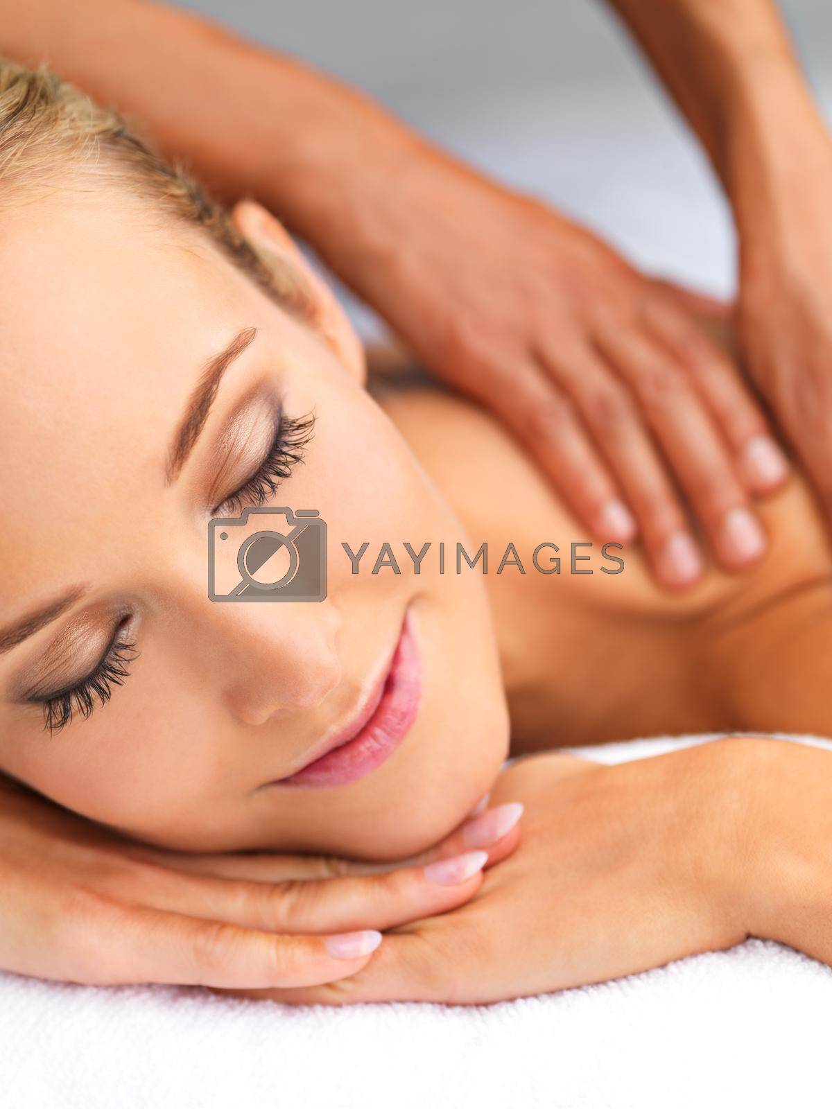 Royalty free image of Indulging in some blissful me time. A beautiful young woman relaxing in a spa - massage therapy. by YuriArcurs
