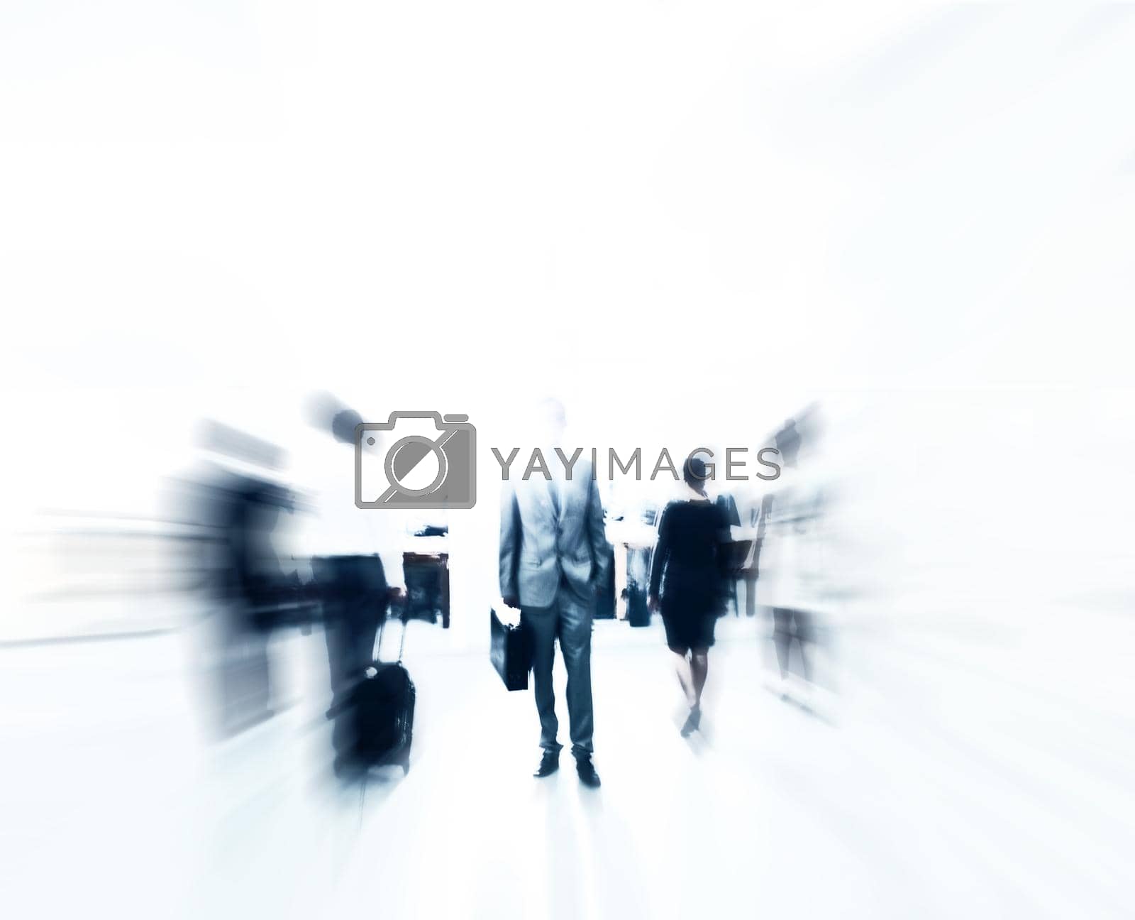 Royalty free image of Rushing through the daily grind. Blurred shot of a businesspeople commuting. by YuriArcurs