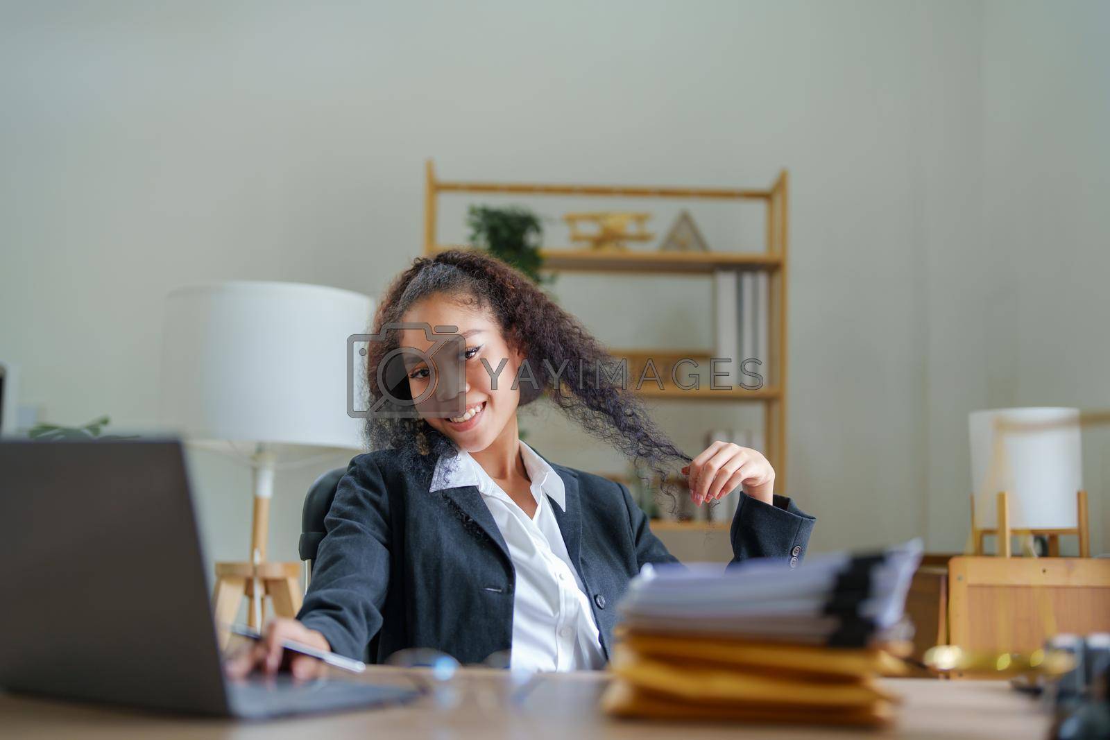 Royalty free image of Portrait of African Americans female lawyer at work at office her by Manastrong