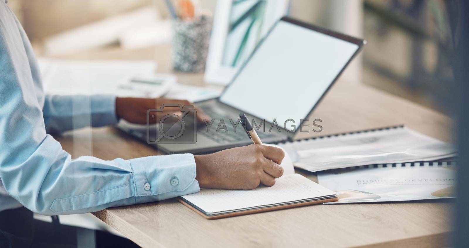 Royalty free image of Notebook planning, laptop email and business person working at office desk, writing agenda in book and typing strategy on computer at work. Corporate receptionist doing schedule and reminder at job by YuriArcurs