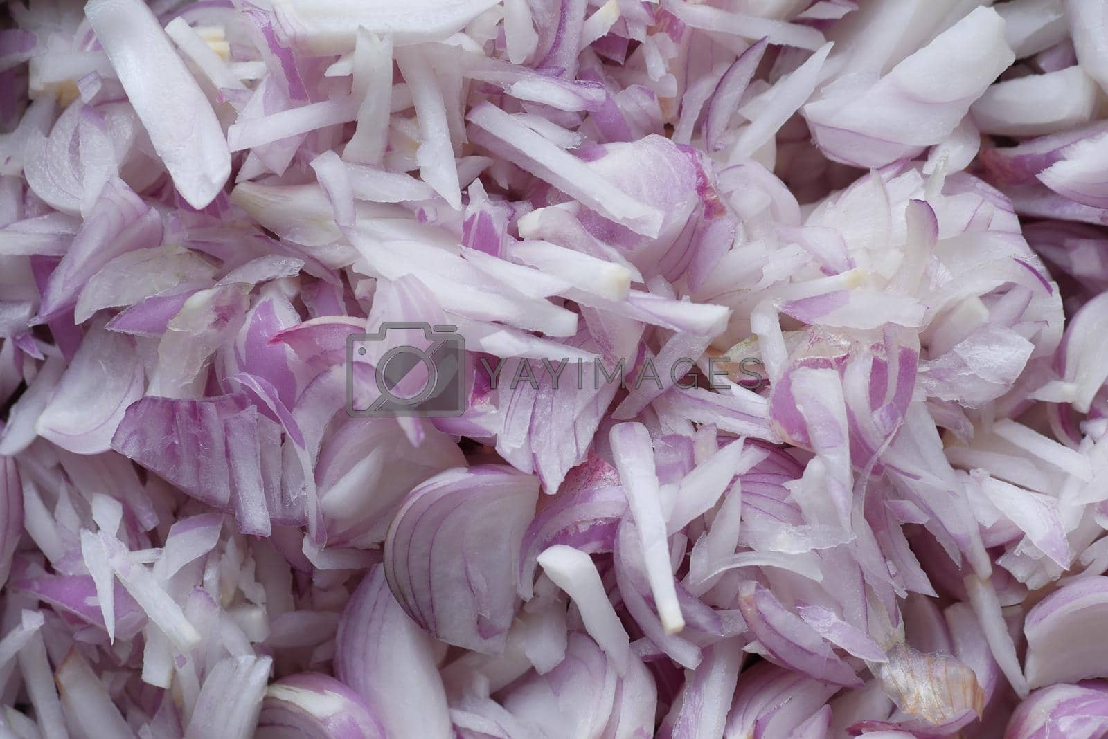 Royalty free image of slow motion of slice of red onion falling by towfiq007