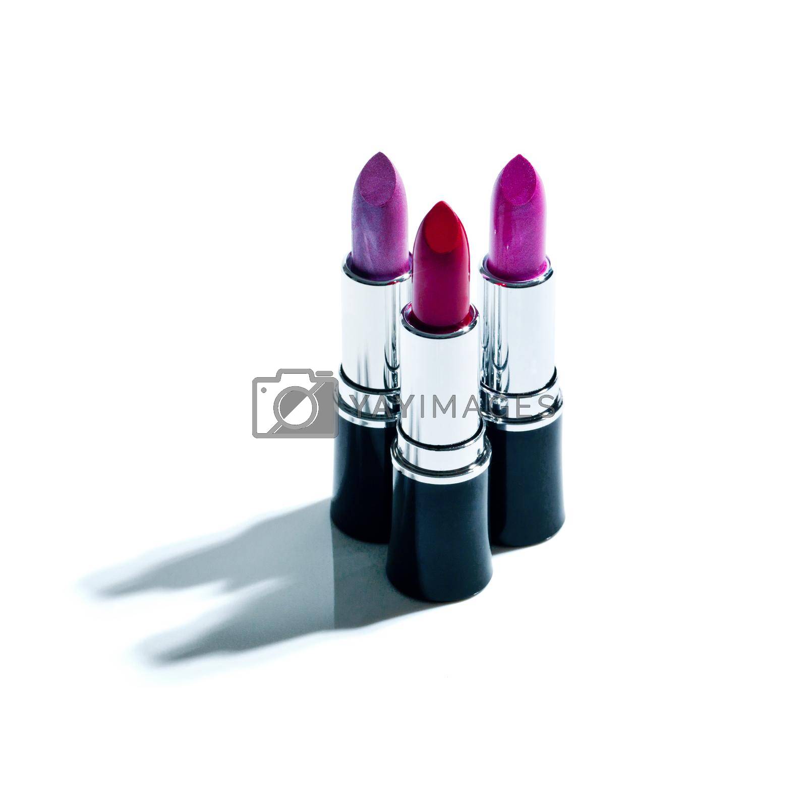 Royalty free image of Sultry shades for your smile. Studio shot of colorful lipstick. by YuriArcurs
