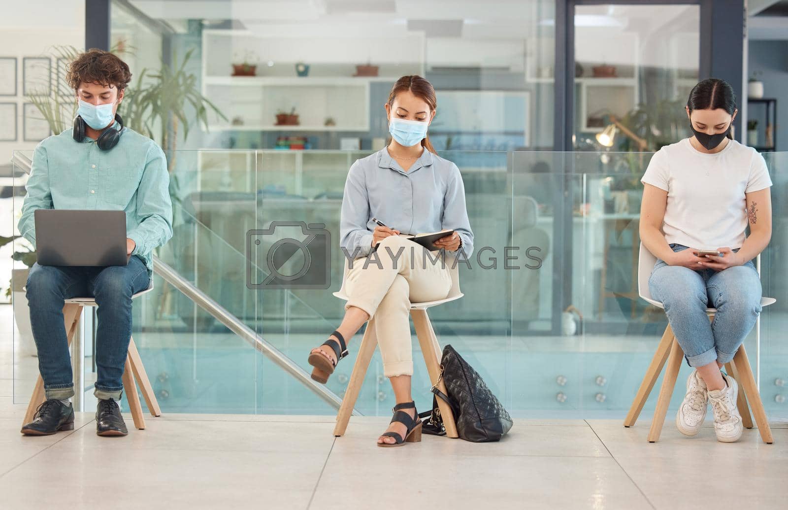 Royalty free image of Covid, recruitment and people in waiting room social distancing and wearing face mask for safety from covid 19 virus. Hiring, company job interview and young man and women wait for business interview by YuriArcurs
