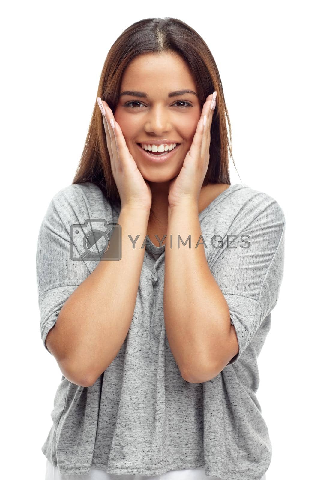 Royalty free image of Never been this happy. Studio shot of an attractive young woman isolated on white. by YuriArcurs