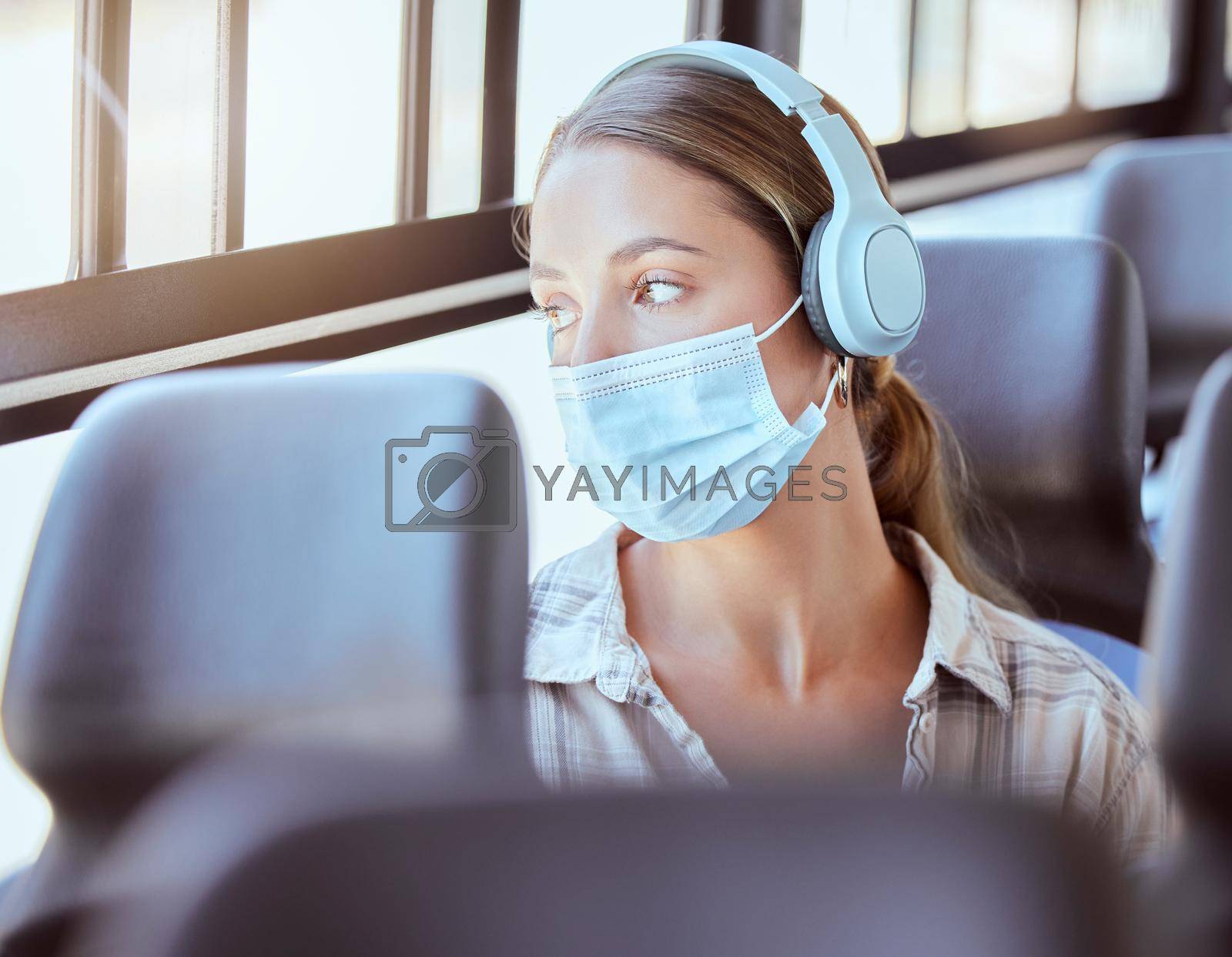 Covid face mask, headphones and woman on bus sad or worried while listening to podcast or music. Person travel in city train transportation with 5g and audio live streaming corona virus news update.