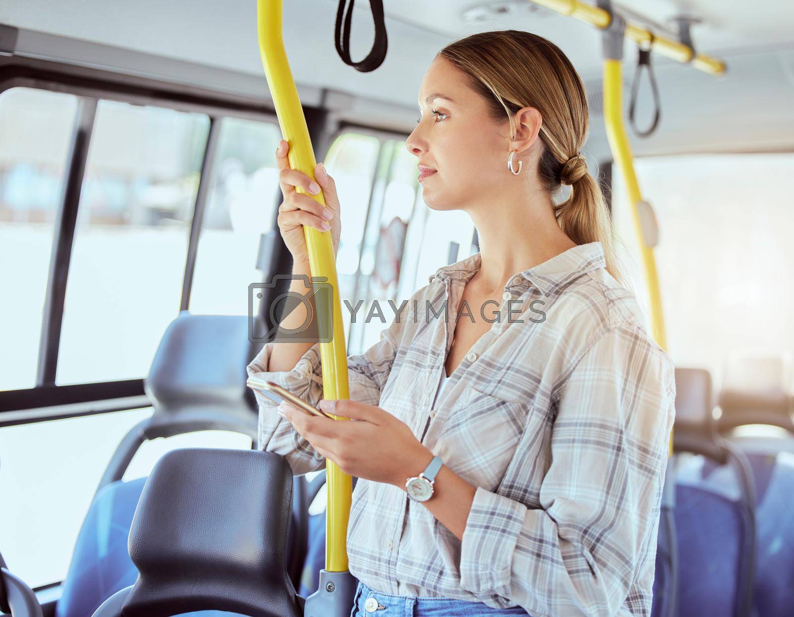Woman travel with smartphone on bus transportation check social media, website or internet for information about the city. Young person with 5g cellphone on public transport in urban town lens flare.