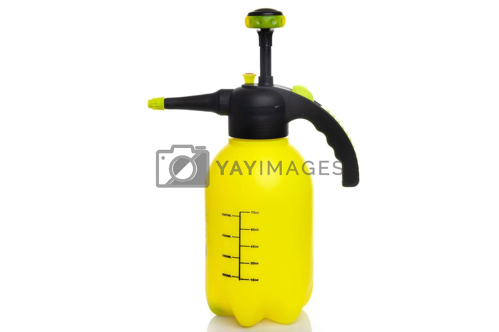Royalty free image of yellow garden sprayer on white isolated background by TRMK
