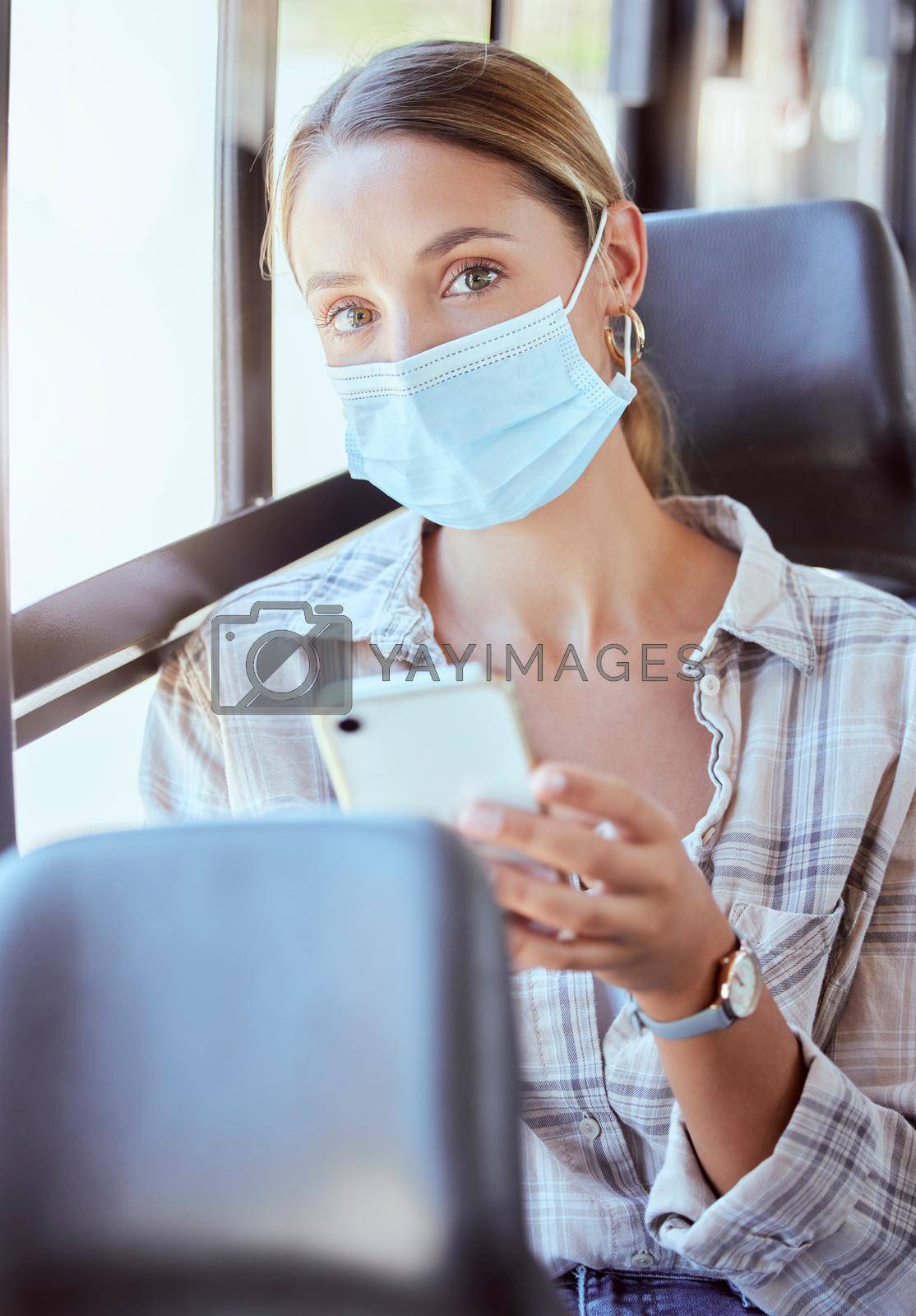 Woman, covid and phone in travel bus for health safety, news and social media with mask. Portrait of a female traveler in public transport during pandemic on mobile smartphone for communication.