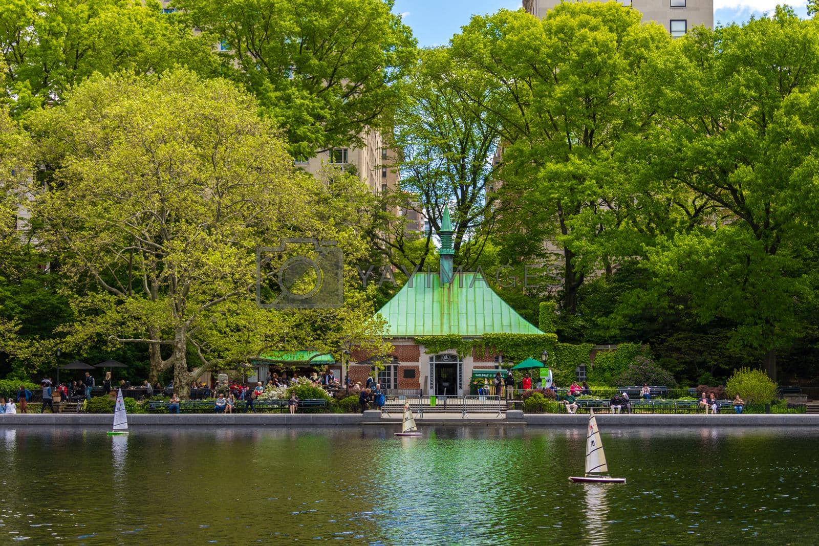 Royalty free image of Miniature remote-controlled sail boat in Conservatory Water pond in the Central Park, New York by Mariakray