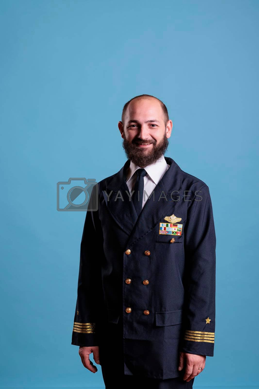 Royalty free image of Airplane captain wearing uniform portrait by DCStudio