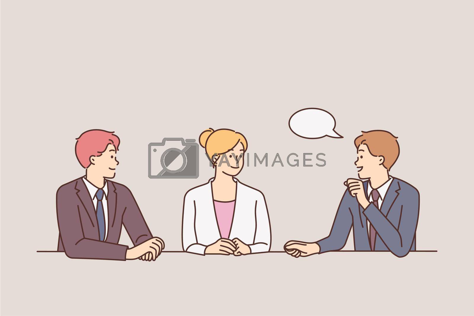 Royalty free image of Businesspeople talk at meeting in office by Vasilyeu