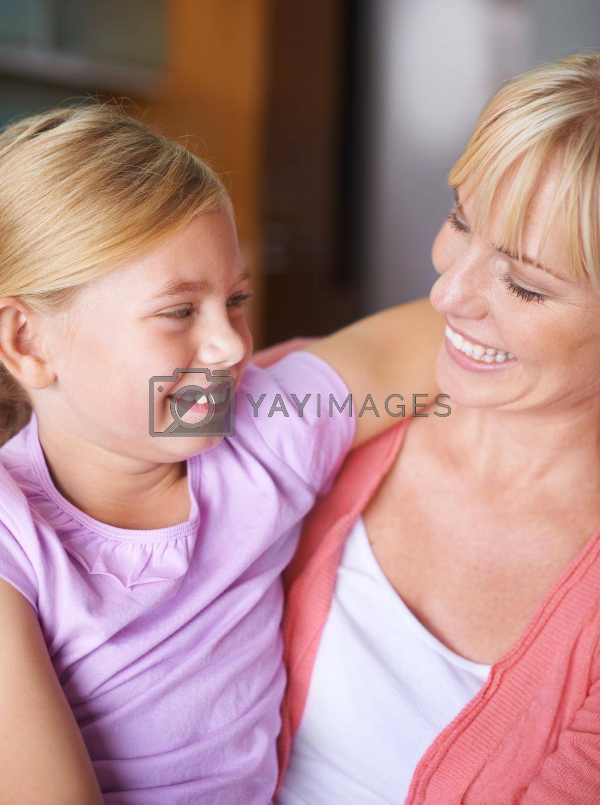 Royalty free image of Sharing a mom and daughter moment. a mother and daughter looking at each other. by YuriArcurs