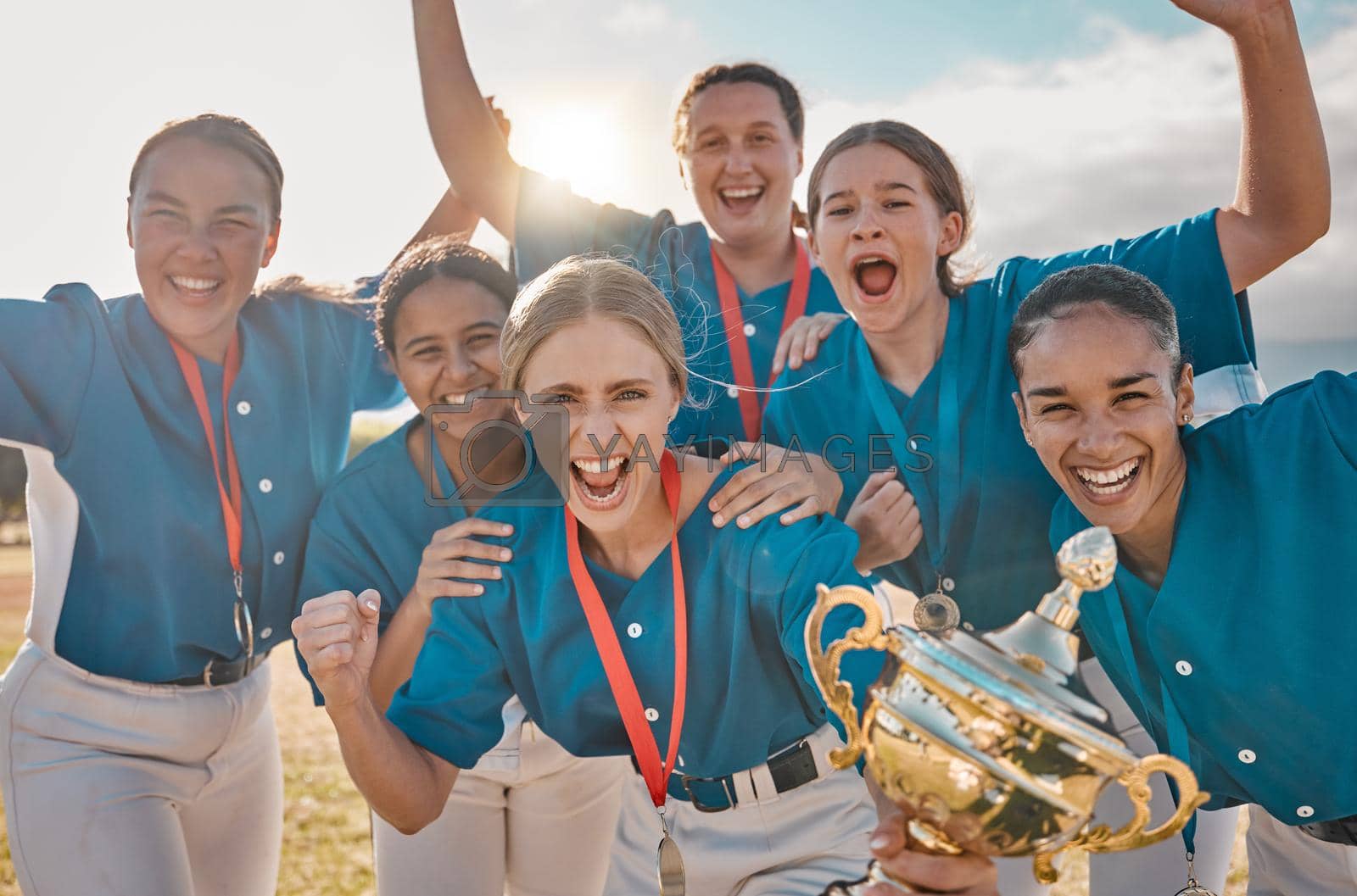Royalty free image of Women baseball team portrait, winning trophy celebration and sports success, champion and competition achievement. Happy girls softball players, winners group and excited athletes holding award prize by YuriArcurs
