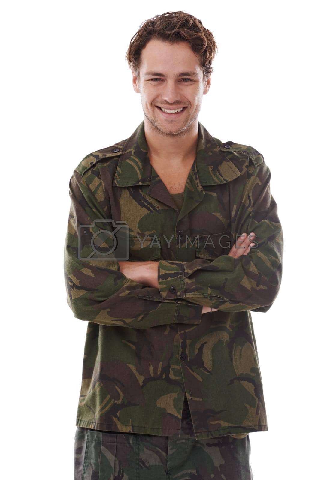 Royalty free image of Proud to fight for his country. A happy soldier against a white background. by YuriArcurs