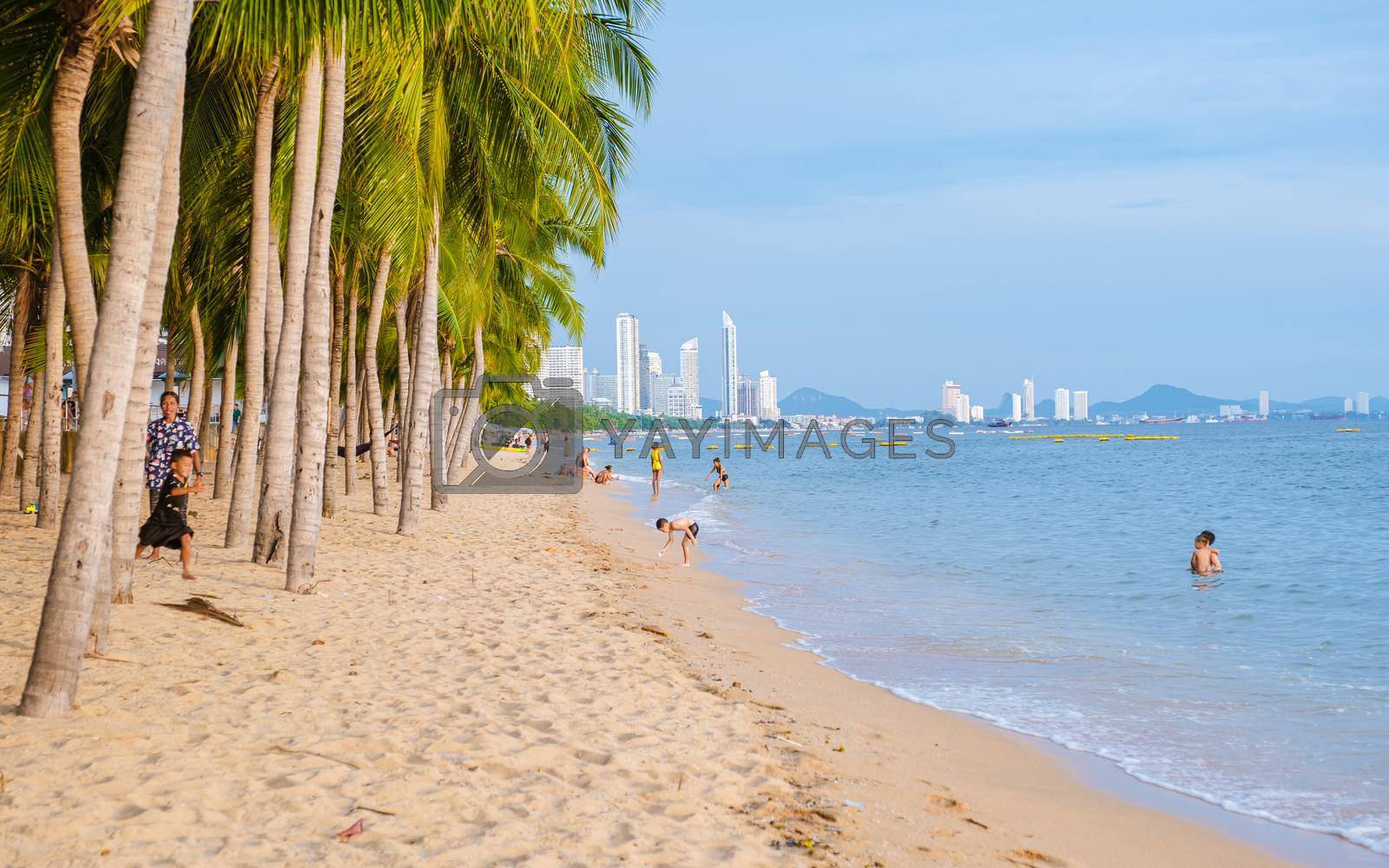Dong Tan Beach Jomtien Pattaya Thailand September 2022, beautiful beach with palm trees during afternoon sunset.