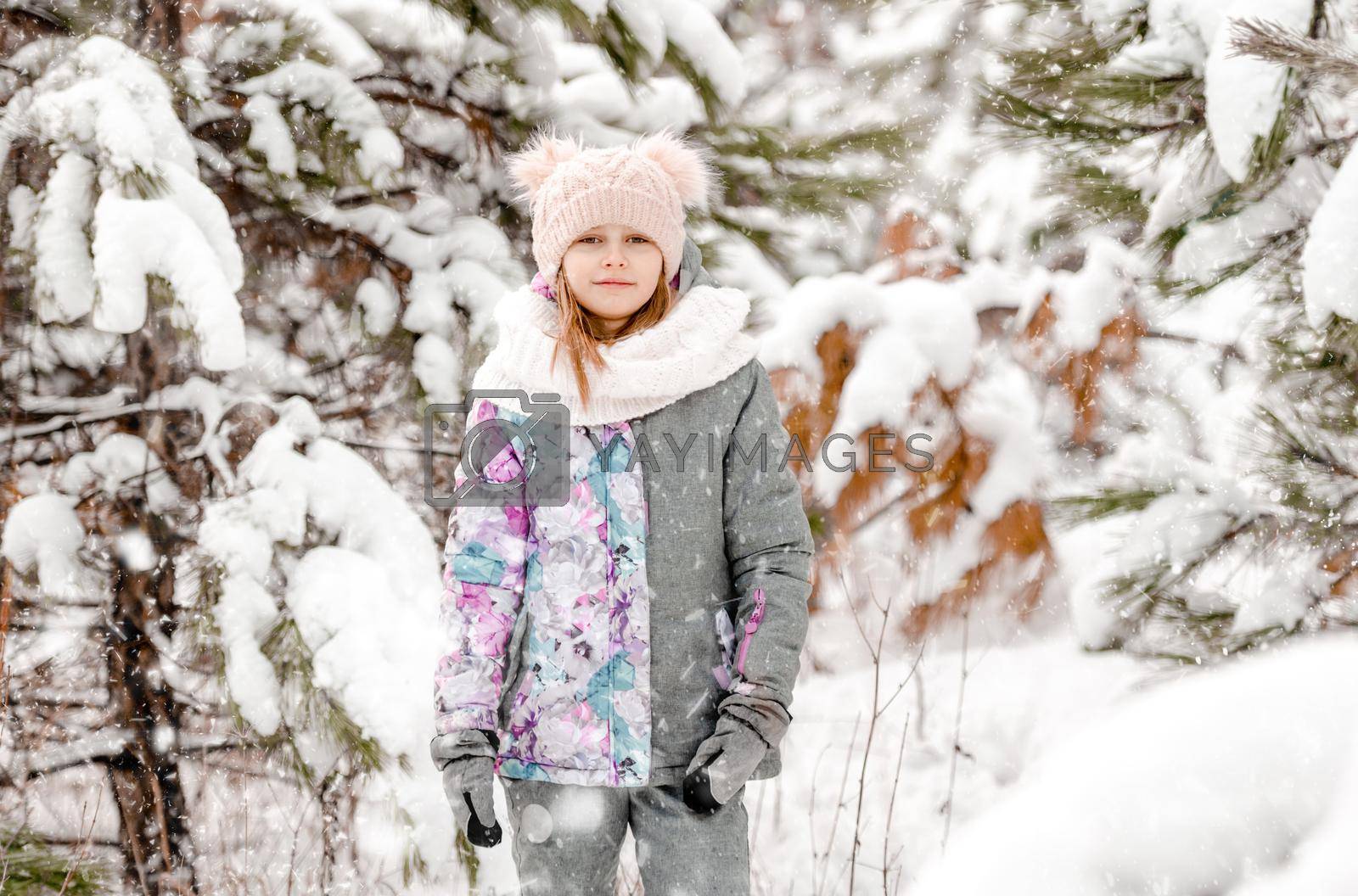 Royalty free image of Preteen girl in winter by tan4ikk1