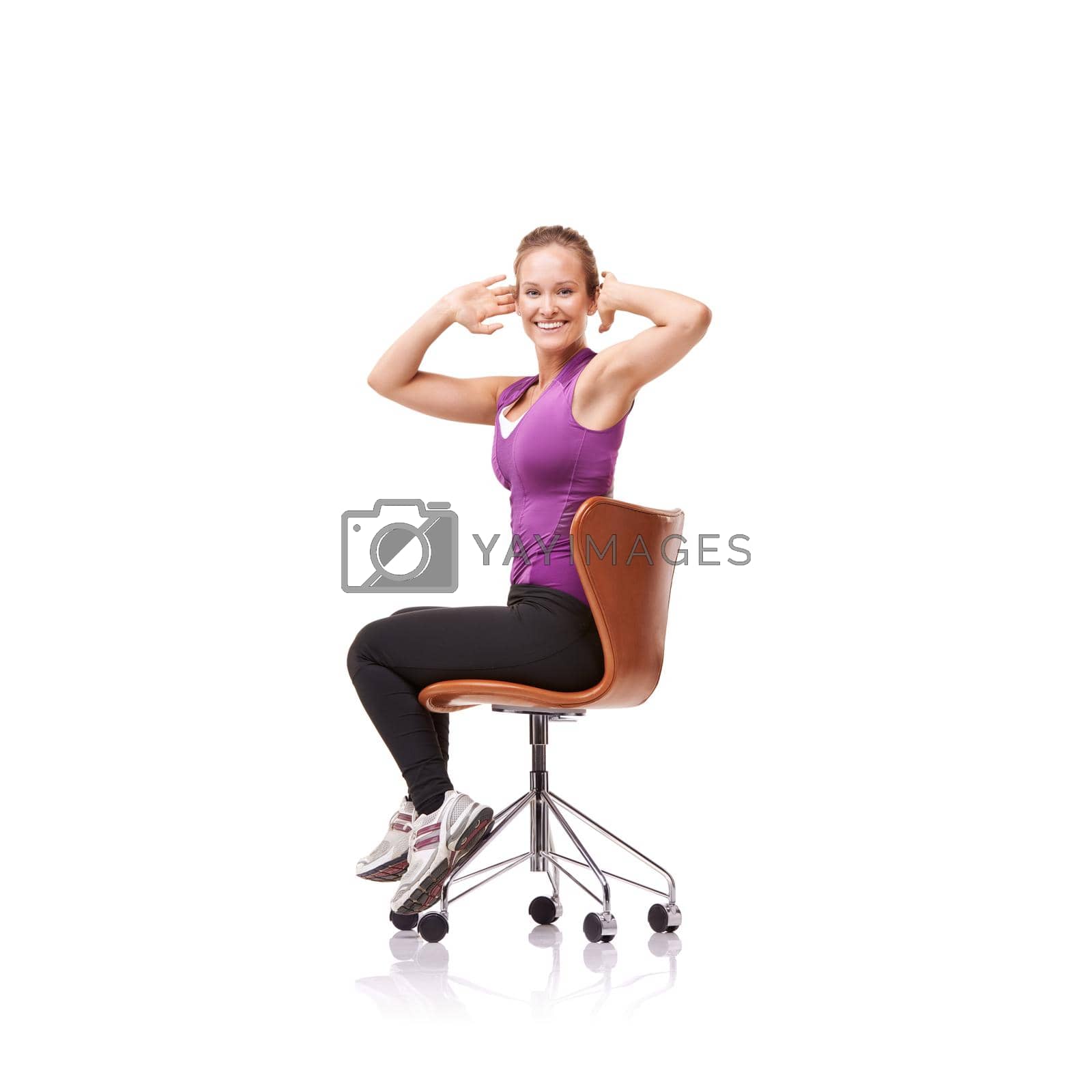 Royalty free image of Perfect for your posture. a sporty woman doing stretches on a chair. by YuriArcurs